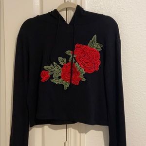 black sweatshirt with roses